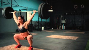 Woman Lifting Barbell Snatch